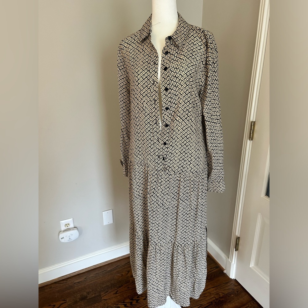 Whistle dress. Tan and blue floral pattern. Size medium. Button up. Tie waist.